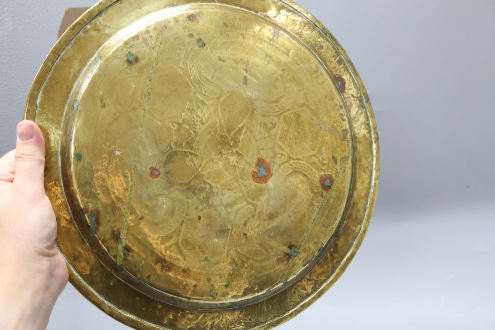 A Persian silver and copper inlaid dish, diameter 30cm